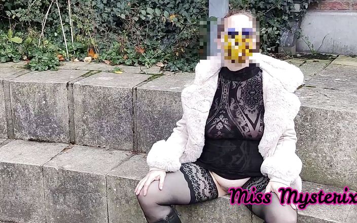 Miss Mysterix: Exhibits in front of strangers with a transparent dress