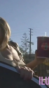 Brunette and blonde lesbians playing with a sex toy