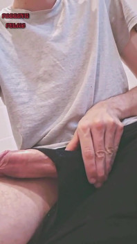 Young Student Touches His Huge Cock in the College Bathroom