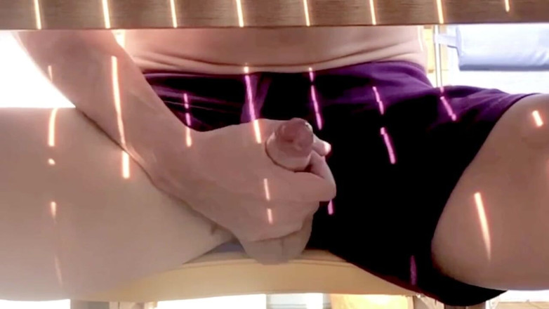 Fuckbutty: Exhibitionist jerks off under the table outdoor