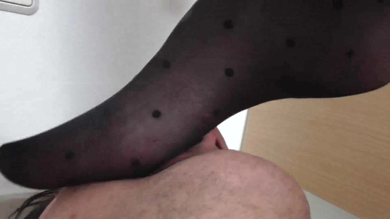 Femdom Austria: Trampling in the kitchen on her slave husband