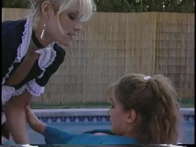 A Lesbian World: Blonde in maid outfit and brunette lick pussy and use...