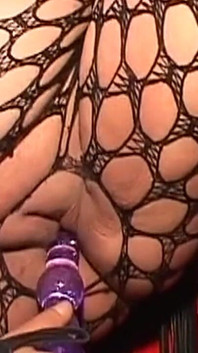 Dominant MILF Teases Her Hooded Submissive with Toys
