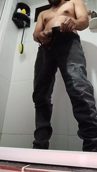 Urinating in Dark Jeans