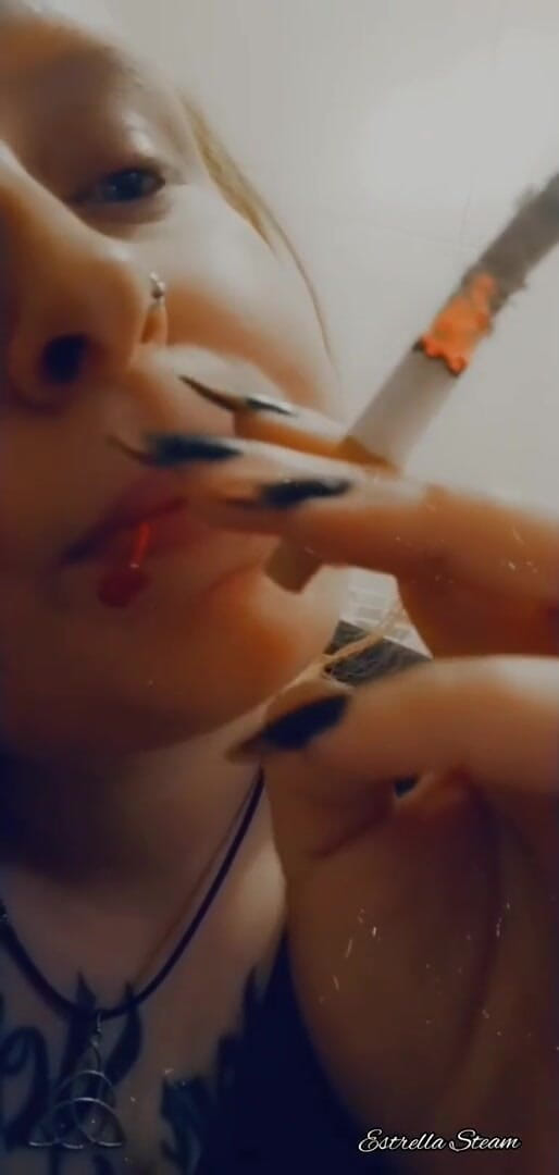 Estrella Steam: Smoking girl close up