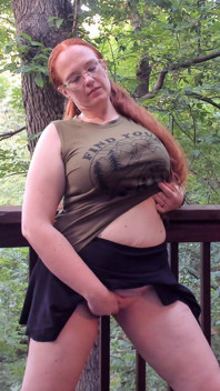 Pigtailed Redhead Stops to Play with Herself on a Hike in the Woods