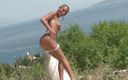 Cryptostudios: Bald model posing naked in the island
