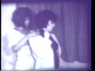 Vintage Usa: Vintage 3some with horny black & white milf and strapon dildo (No audio...