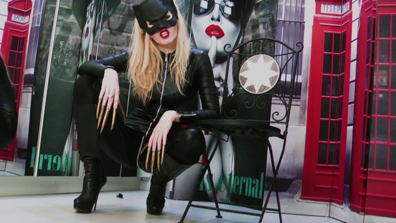Goddess Celine: Between catwoman 's claws