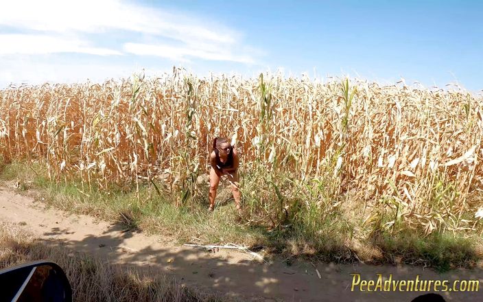 Pee Adventures: Piss herself in a corn field and wet her pristine...