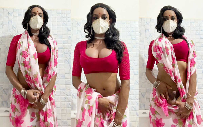 Anushka Crossy: Crossdresser dalam saree merah jambu melancap