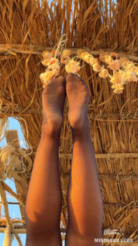 The Best View on the Beach Is Not the Sea, but My Feet in Black Tights Hanging Over Your Head