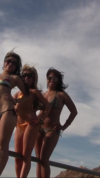 Three Girls in Bikinis on a Mountain Top Get Naked and Play with Each Other
