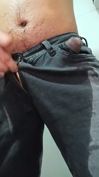 Urinating in Dark Jeans