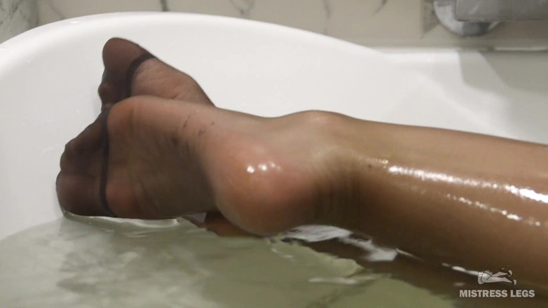 Mistress Legs: Mistress wet nylon feet teasing in the bath