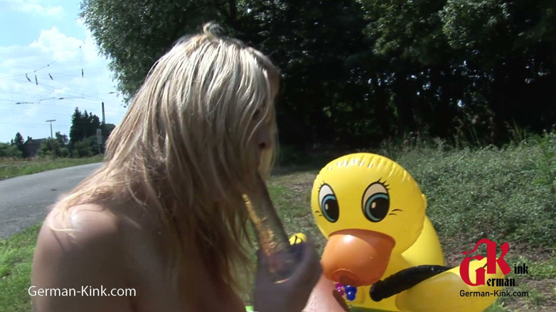German Kink: Sexy MILF lesbians by the road, in the little pool,...
