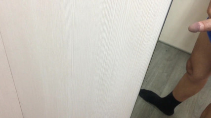 Our Secrets: Fitting room wank while she tries on clothes