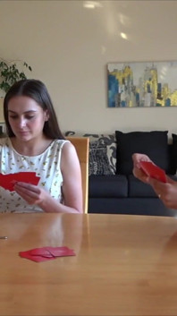Strip Spoons Card Game with Two Enthusiastic Players