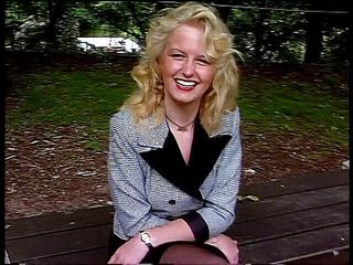Lucky Cooch: Classy blonde giving an outdoor interview