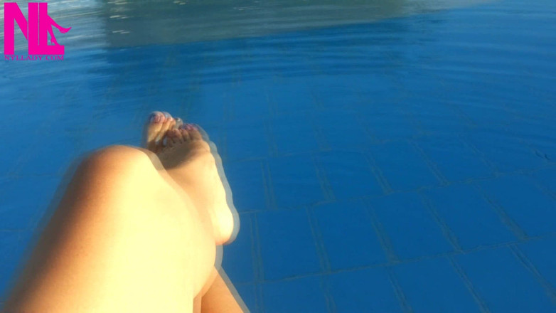 Nyllady: Barefoot Dangling in Swimming Pool Water