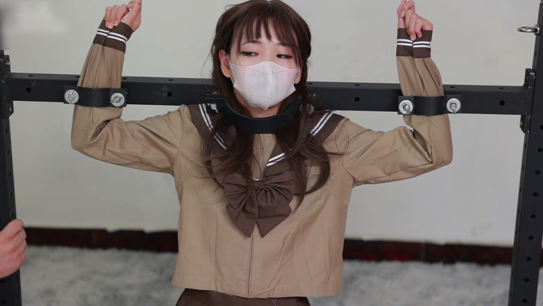 Asian bondage: Metal Binds Her Hands, Ropes Bind Her Feet, and Her...