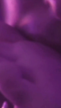 Young Girl Using Her Feet to Play with the Dildo While Masturbating
