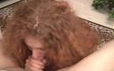 Cumming Soon: Red Haired Slut Gives a Blowjob to a Cock