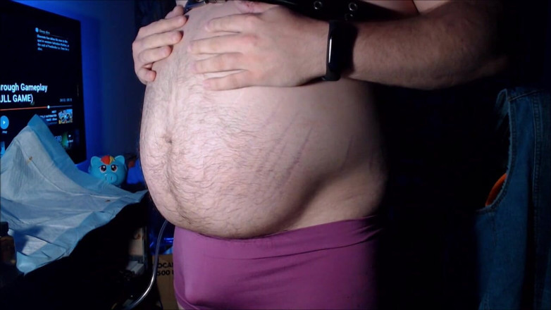 Akevantelico91: Belly inflation in purple boyshorts