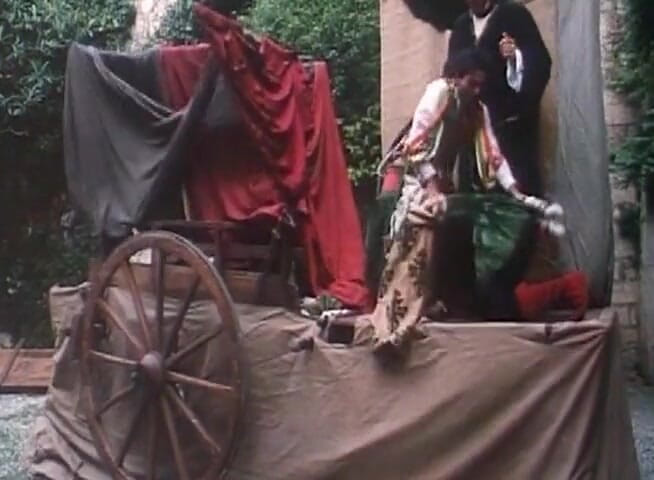 Fetish World: Redhead fucking a man in the back of a wagon
