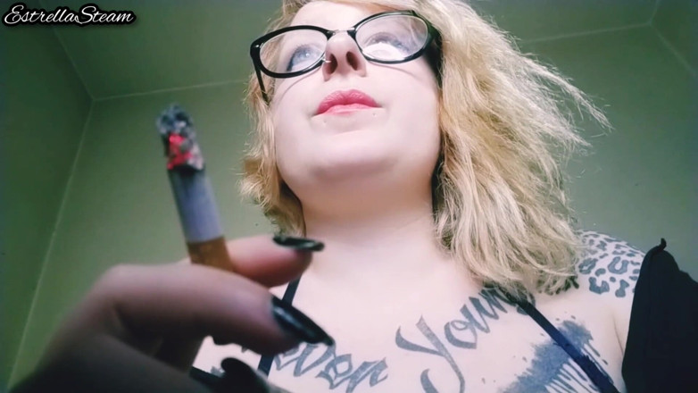 Estrella Steam: Blonde smokes a cigarette NO AUDIO