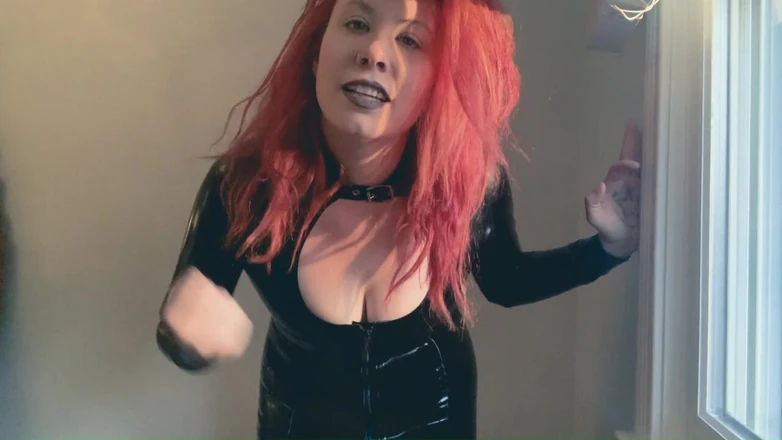 Deanna deadly: Redhead Super Villainess in Latex Needs Your Cum