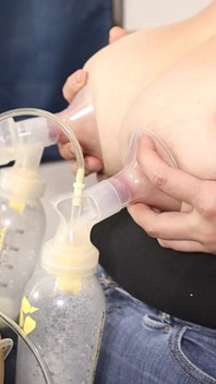 Breast Milk Pumping From the Side