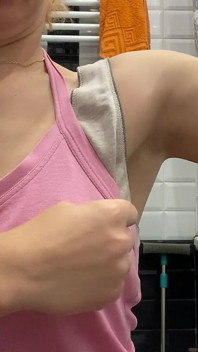 Strong Woman Shows Her Muscles and Armpits