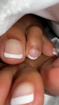 Ebony Girl Under Her Covers in Bed Show off Feet