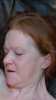 Mature Redhead Slurps Cock While Stretched Wide in Group Frenzy