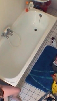 Sexy chubby amateur fucks herself in the bathroom