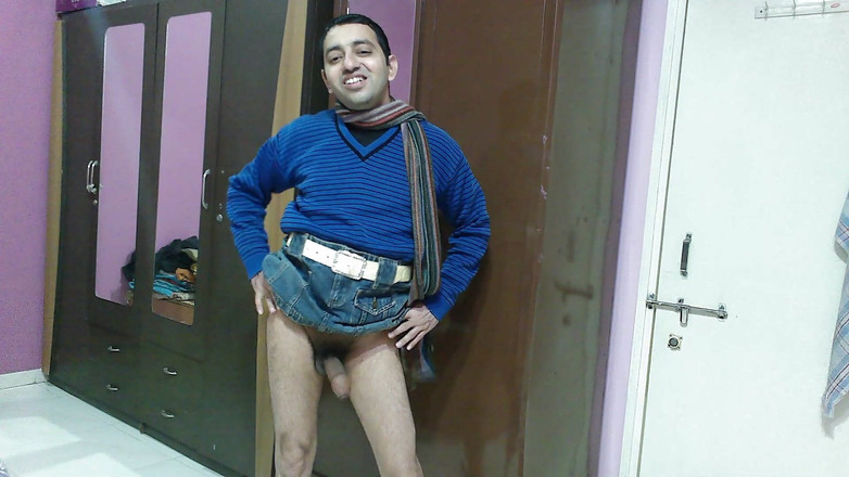 Cute & Nude Crossdresser: Hot sexy boy in a demim skirt showing his dick.