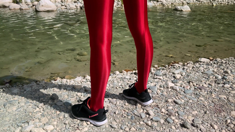 Shiny teens: Shiny red lycra tights and microdress on mountain river