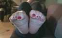 Pov legs: Playing with bare feet on the couch top view