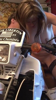 Skanky blonde rides motorcycle fucking machine