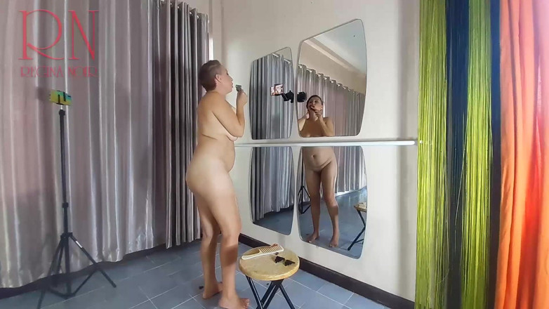 Regina Noir: Naked nudist hairdresser. She cuts her own hair. Regina Noir...