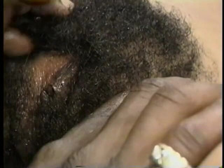 Hot and Wet: Unshaven black chick gets fucked in her hairy hole