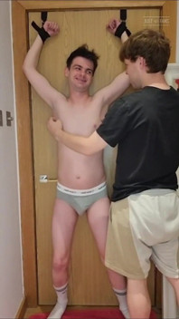 Tied to the Door and Tickled Until I Wet Myself