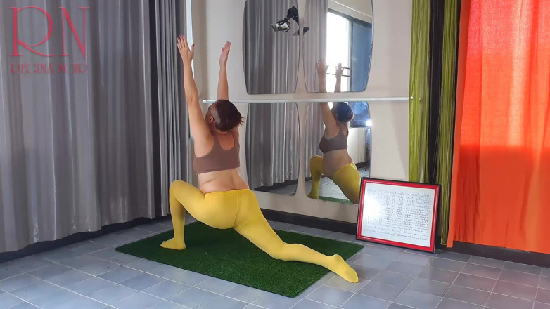 Regina Noir: Regina Noir. Yoga in yellow tights doing yoga in the...