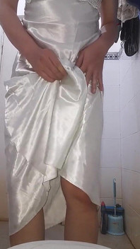Asian Crossdresser wearing long silky nightie gown