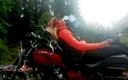 Real fun &amp; fetish: Red lips blonde smoking sensually on Rasta bike outdoor
