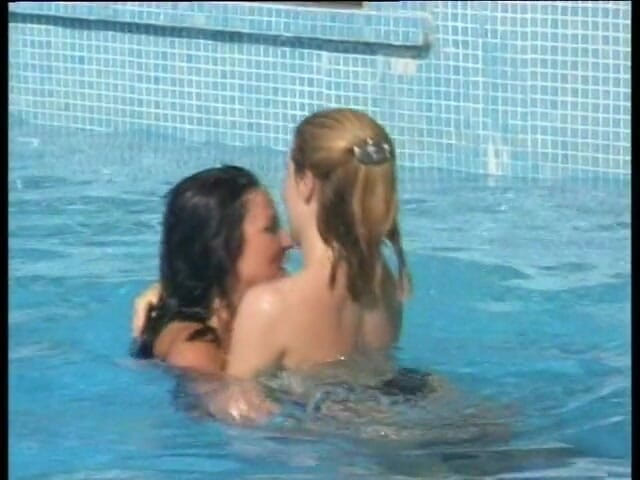 Naughty Girls: Busty lesbians pussy licking each other by swimming pool