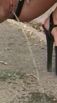Yellow Pee Between High Heels