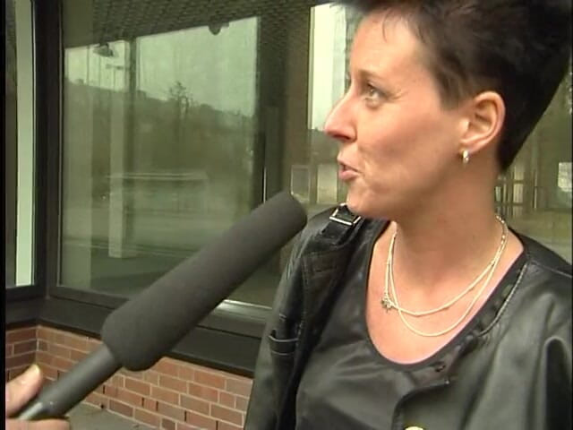 Lucky Cooch: A short-haired German girl was interviewed outdoor.