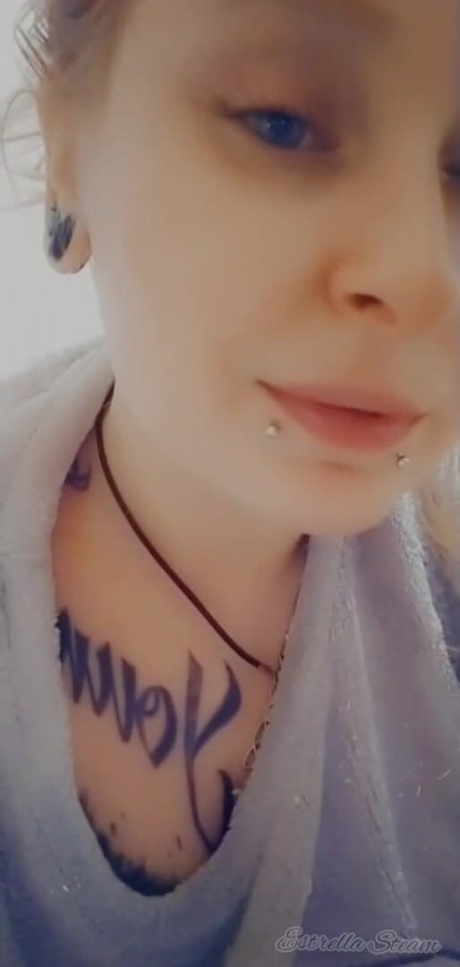 Estrella Steam: Girl with piercings smokes a cigarette